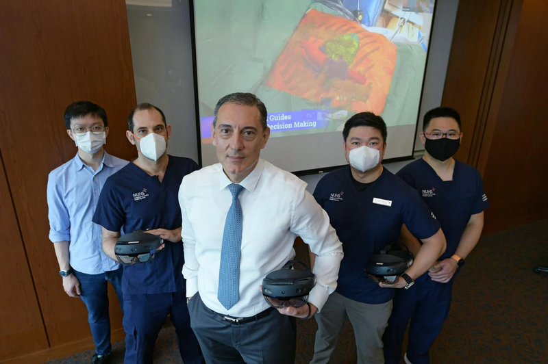 (From left) Ng Kian Wei (Data scientist, NUHCS), Dr Ilias Skaltsiotis (clinical fellow), Theodoros Kofidis (Associate Professor), Dr Chang Guohao, and Dr Gao Yujia (NUH associate consultant and Vice-Chairman of the Holomedicine Association)